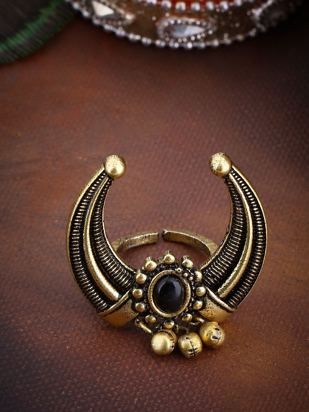 

Studio Voylla Gold-Plated Durga Mahisha Adjustable Statement Oxidised Finger Ring