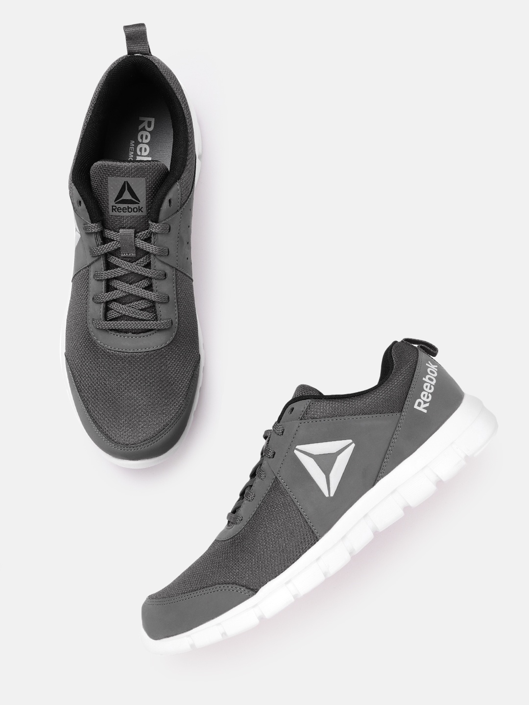 

Reebok Men Woven Design TRAVELLAR LP Running Shoes, Grey