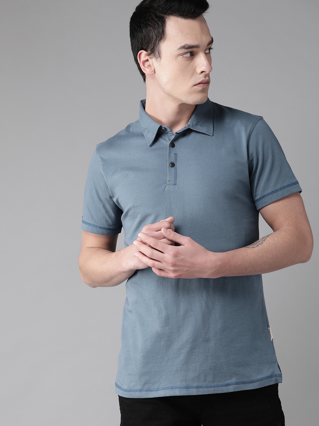 

The Roadster Lifestyle Co Men Navy Blue Solid Polo Collar Pure Cotton T-shirt