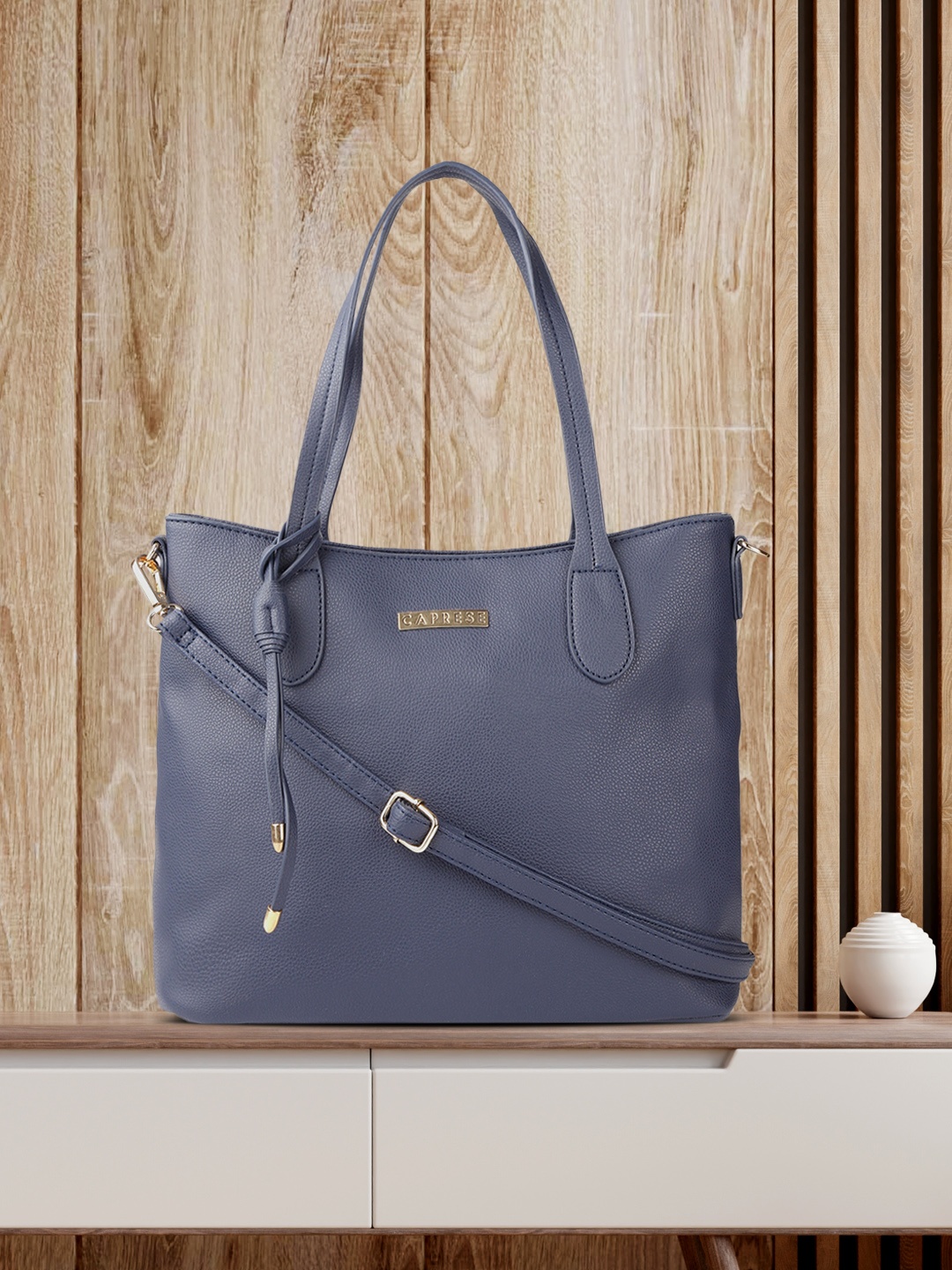 

Caprese Navy Blue Solid Shoulder Bag