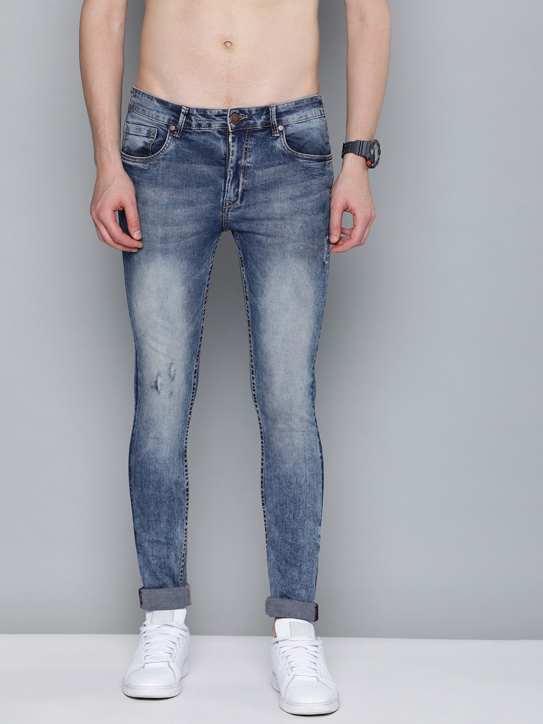 

HERE&NOW Men Blue Skinny Fit Mid-Rise Low Distress Stretchable Jeans