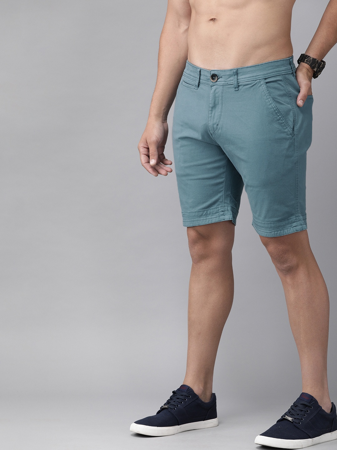 

Roadster Men Teal Blue Solid Regular Fit Chino Shorts