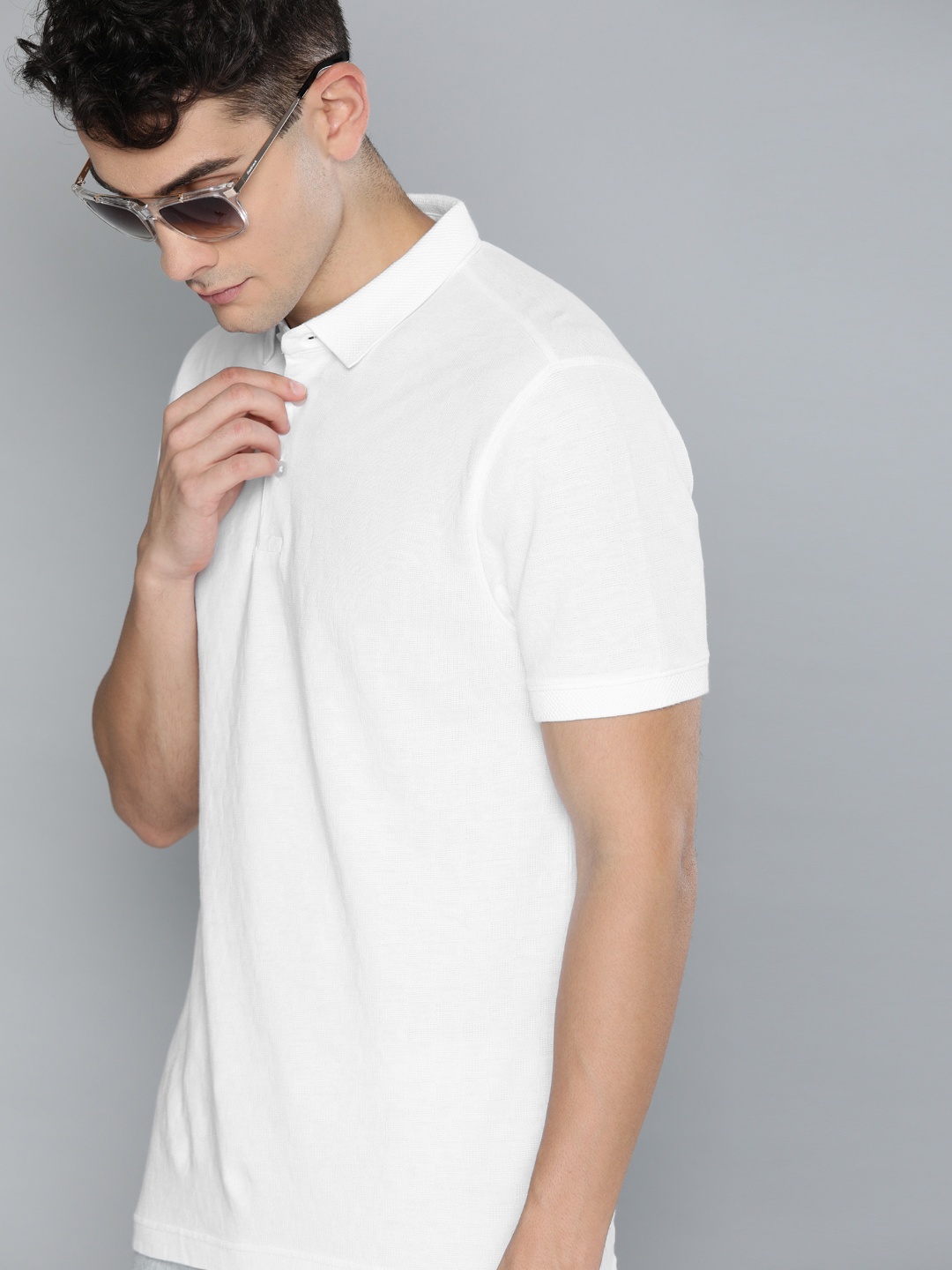 

Levis Men White Self Design Polo Collar Pure Cotton T-shirt