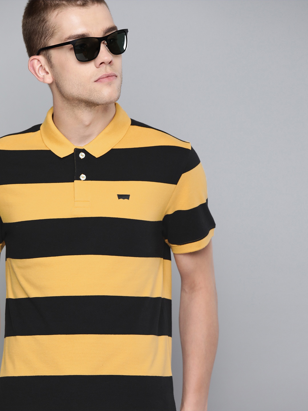 

Levis Men Mustard Yellow Black Striped Polo Collar Pure Cotton T-shirt