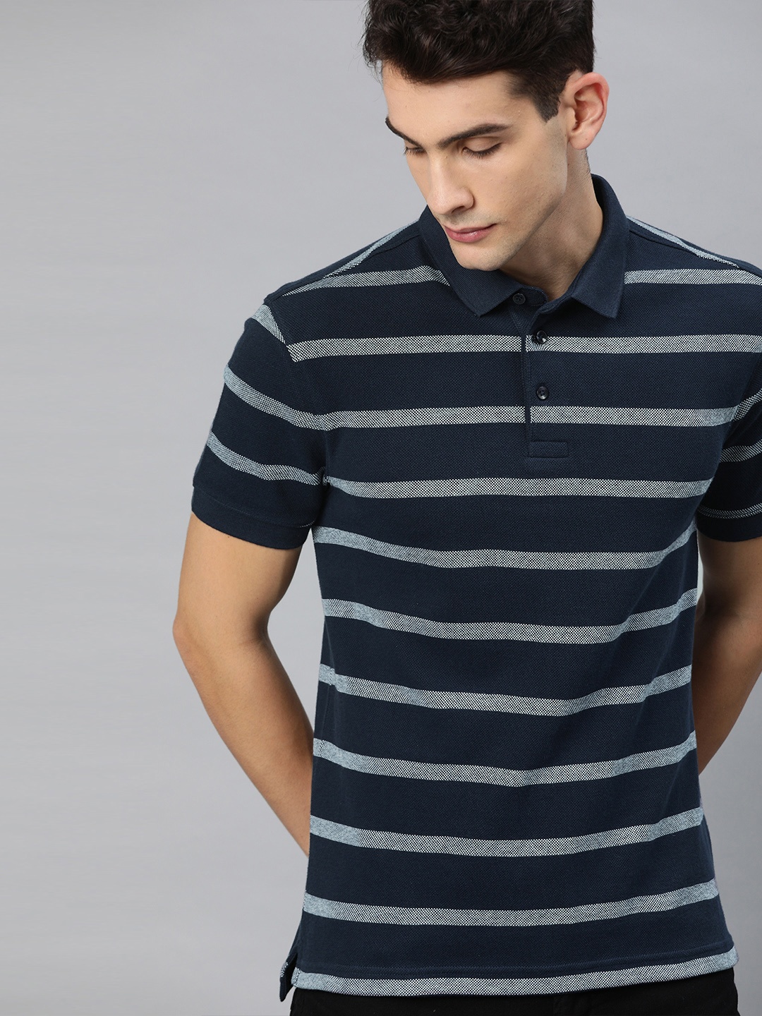 

Levis Men Blue Striped Polo Collar T-shirt