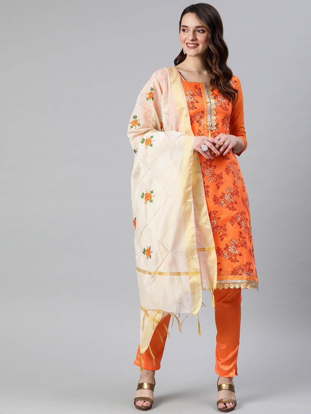 

Rajnandini Orange & Beige Printed Silk Blend Unstitched Dress Material