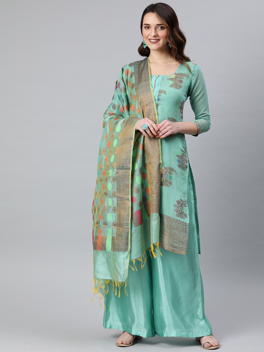 

Rajnandini Turquoise Blue & Copper-Toned Silk Blend Unstitched Dress Material