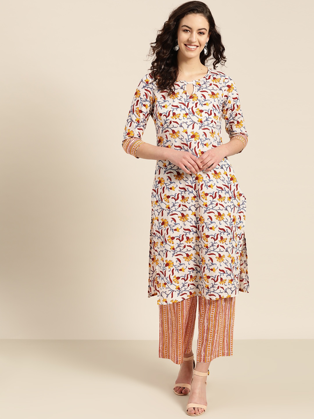 

Sangria Women White & Coral Orange Printed Kurta with Palazzos