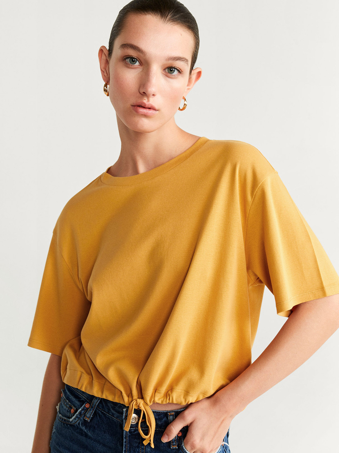 

MANGO Women Yellow Solid Round Neck T-shirt
