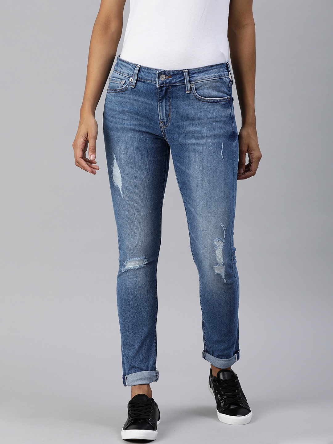 

Levis Women Blue 711 Skinny Fit Mid-Rise Highly Distressed Stretchable Jeans