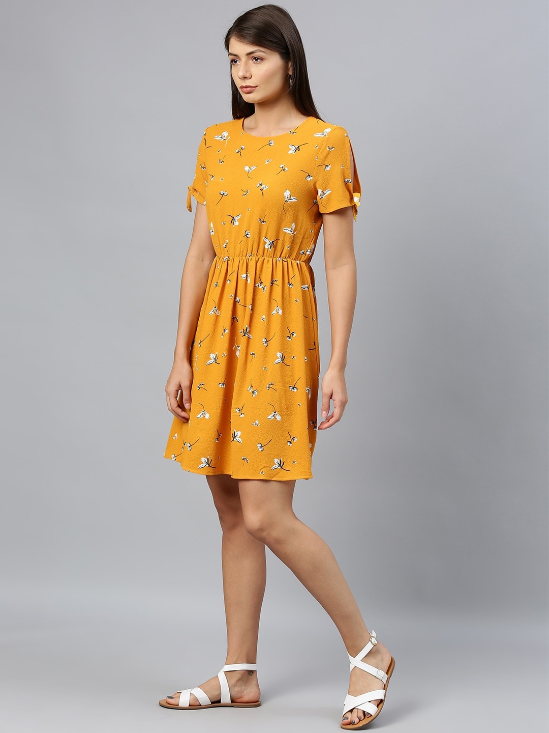 

Chemistry Women Mustard Yellow & White Floral Print Fit & Flare Dress With Tie-Up Sleeves