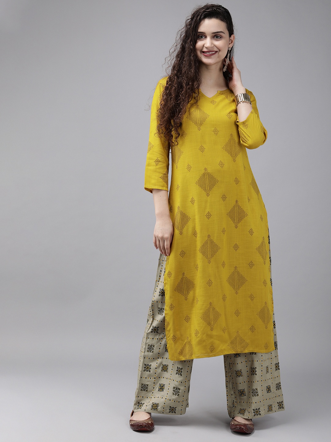 

Anouk Women Mustard Yellow & Beige Printed Kurta with Palazzos