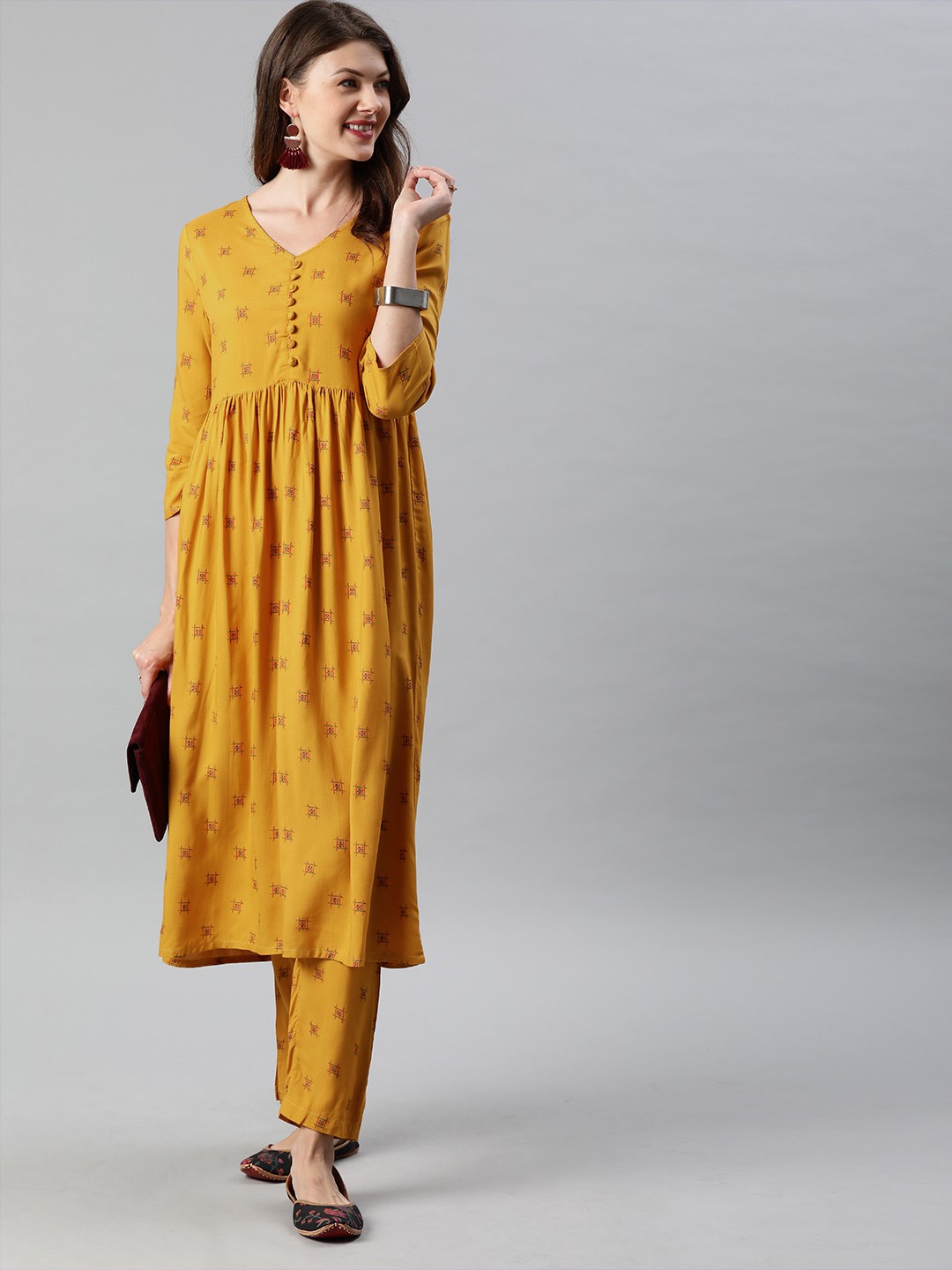

Anouk Women Mustard Yellow Printed Kurta with Trousers