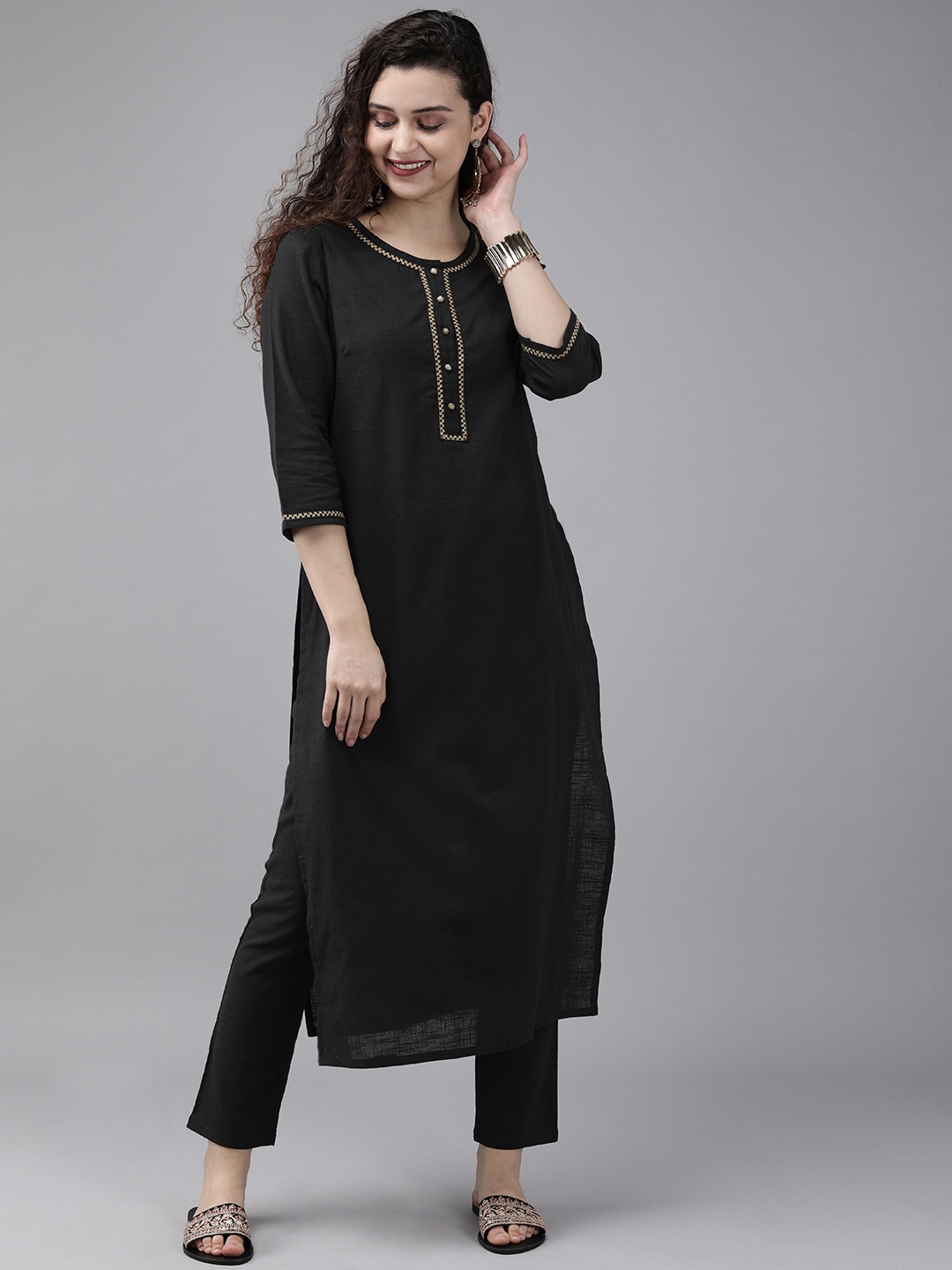 

Anouk Women Black Solid Kurta with Trousers