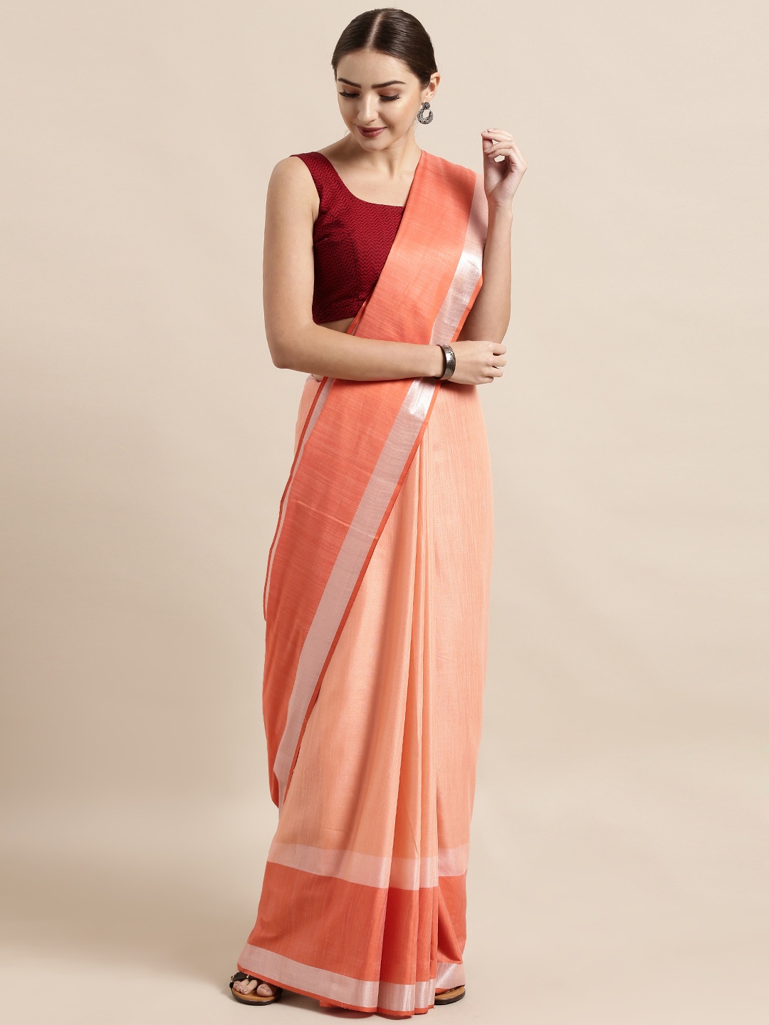 

VASTRANAND Peach-Coloured Solid Linen Blend Saree