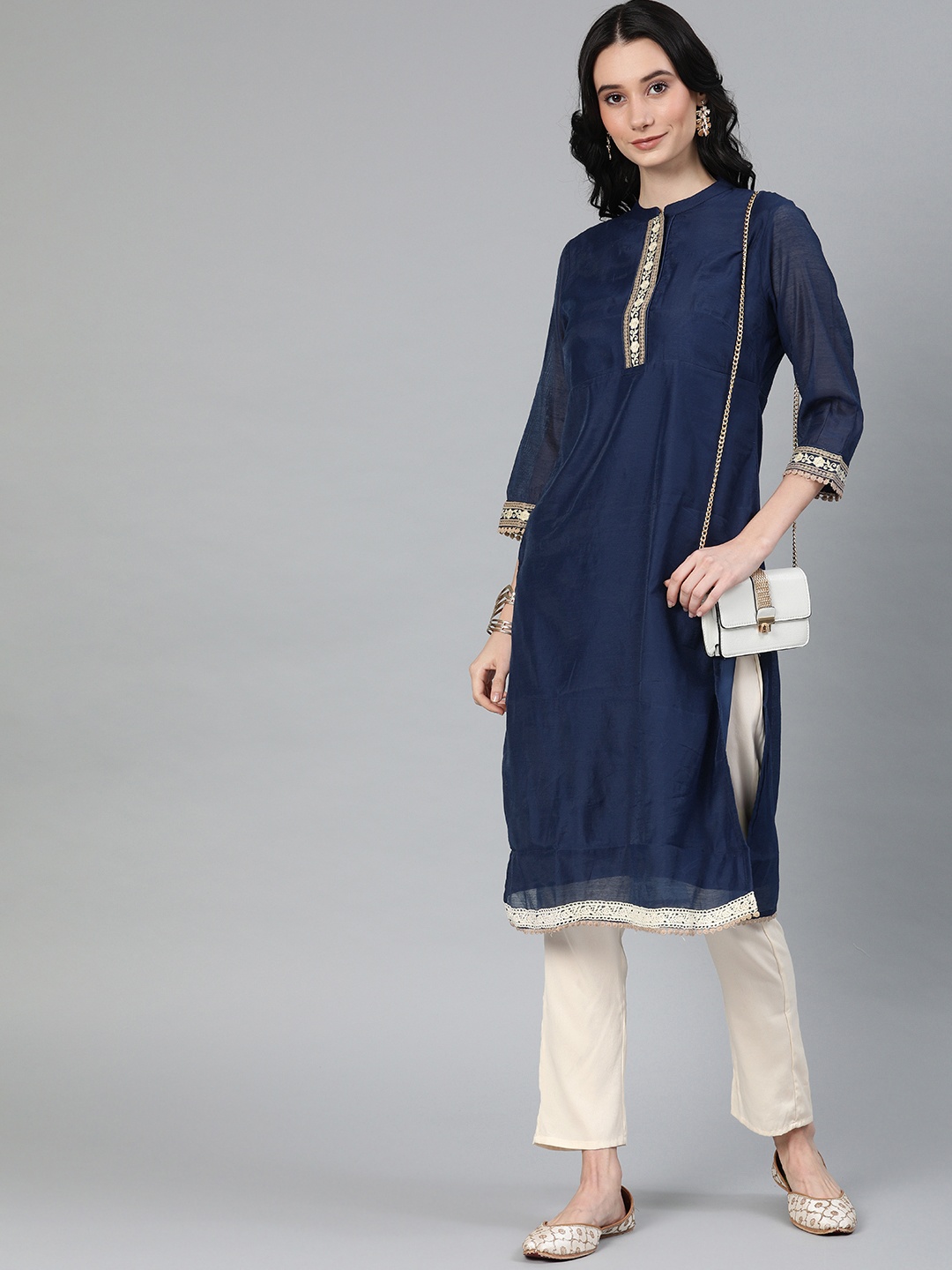 

Anouk Women Navy Blue & Off-White Solid Kurta Set with Embroidered Detail