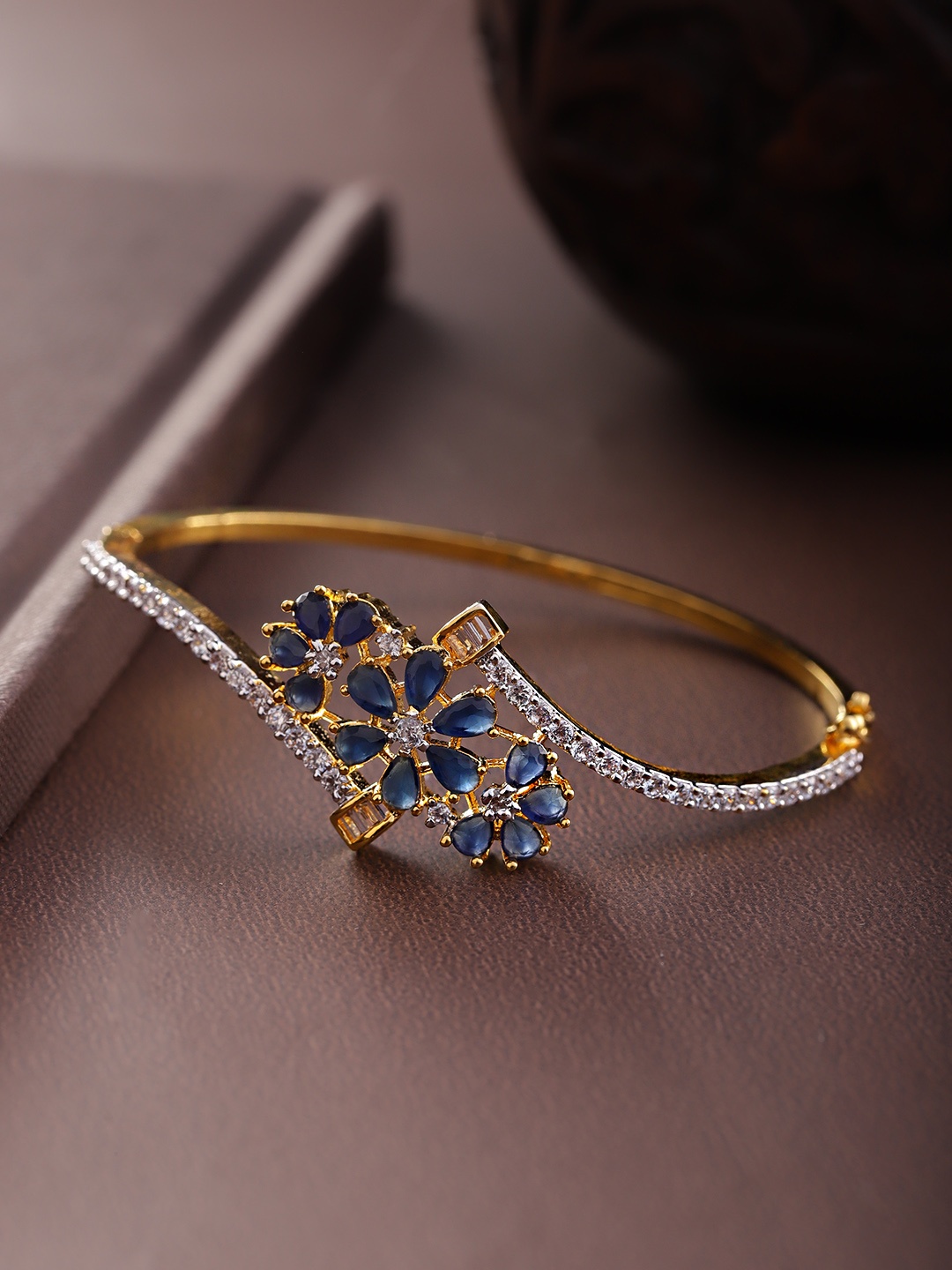 

Priyaasi Navy Blue Gold-Plated Stone Studded Handcrafted Bangle Style Bracelet