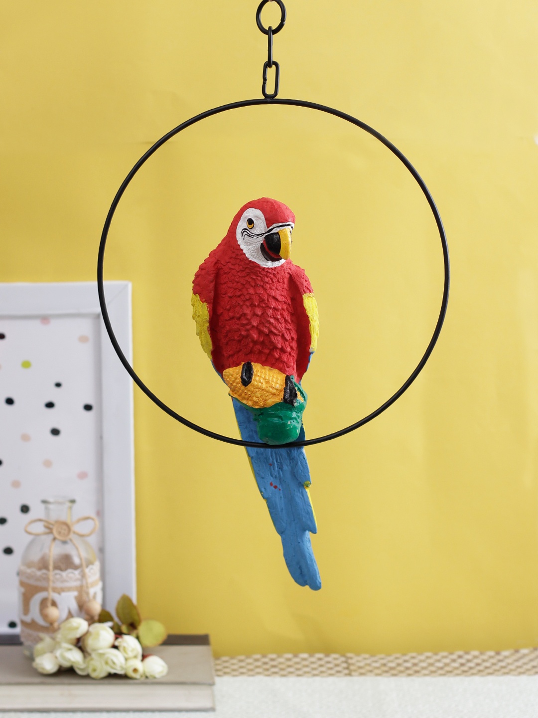 

TIED RIBBONS Red & Blue Hanging Parrot Figurine