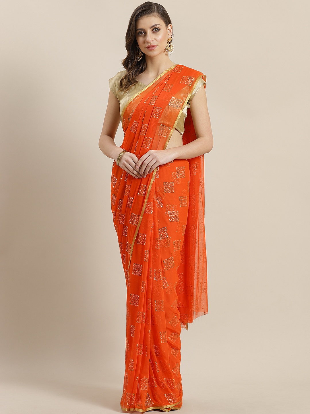 

Ishin Orange & Golden Rubber Printed Saree