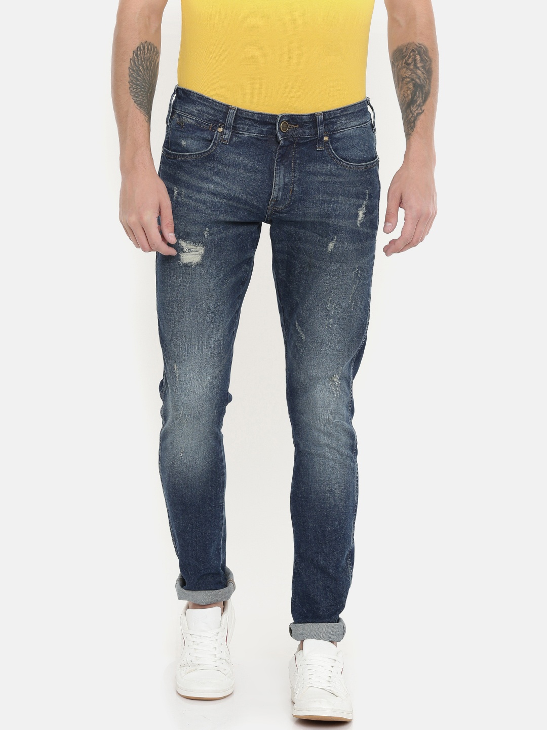 

Wrangler Men Blue VEGAS Skinny Fit Low-Rise Mildly Distressed Stretchable Jeans