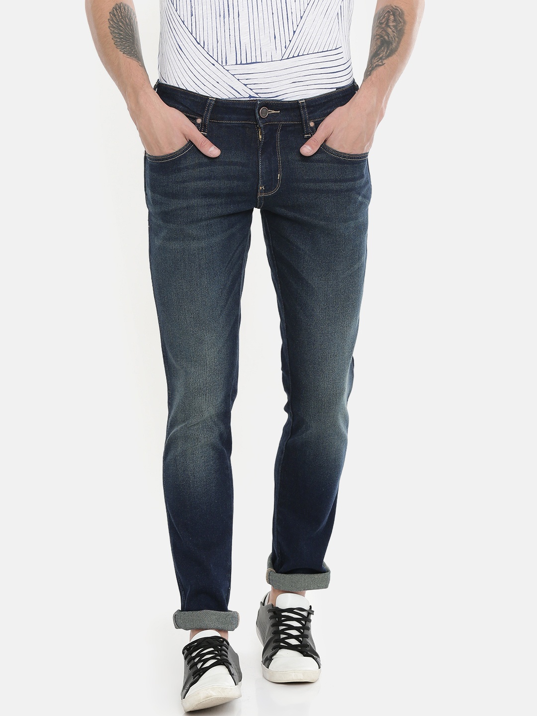 

Wrangler Men Blue Skanders Slim Tapered Fit Low-Rise Clean Look Stretchable Jeans