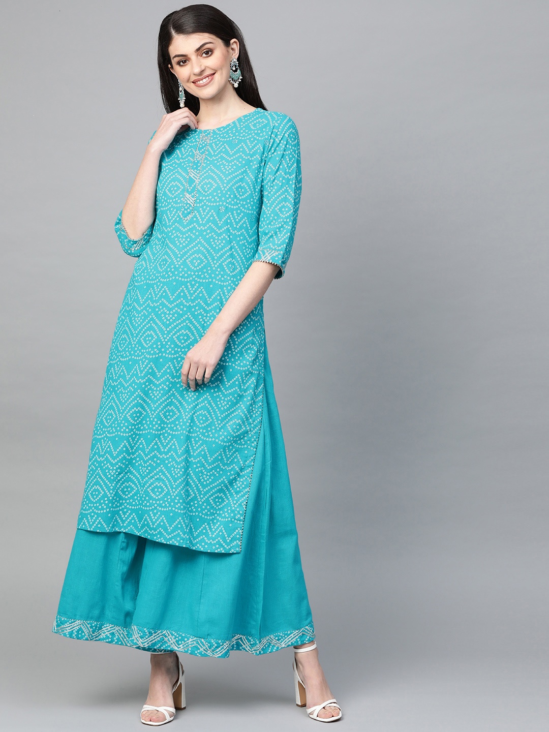 

Ishin Women Turquoise Blue & White Bandhani Print Kurta with Palazzos