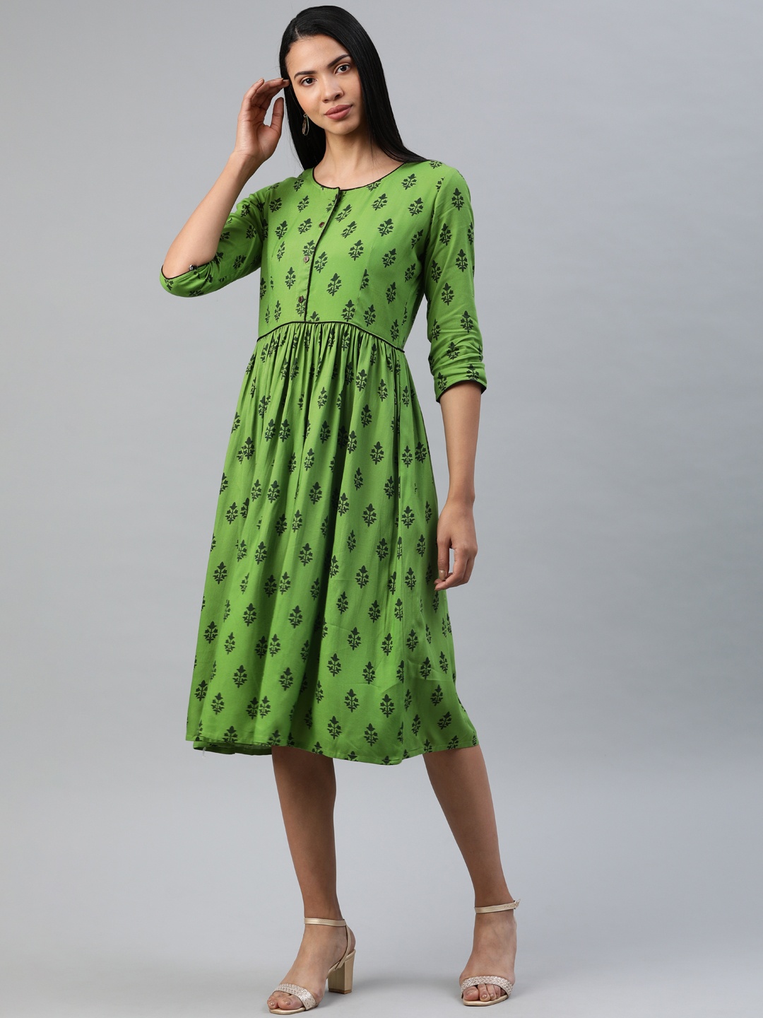 

Swishchick Women Green Printed Fit and Flare Dress