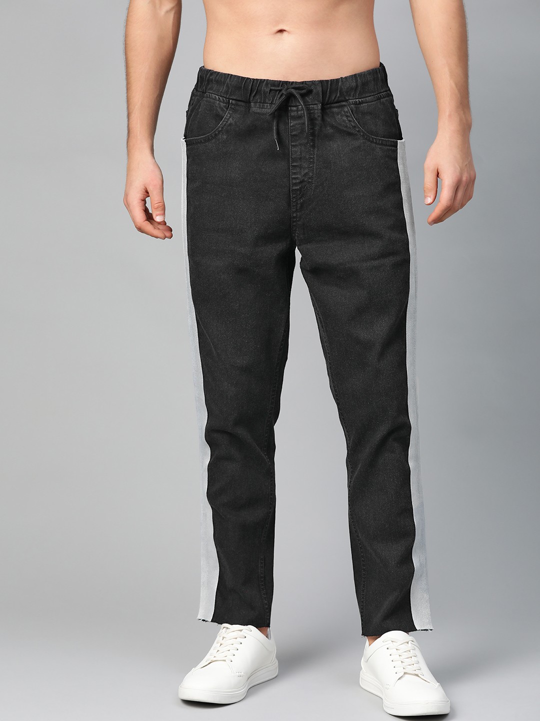 

Kook N Keech Men Black Jogger Fit Mid-Rise Clean Look Side Striped Stretchable Jeans