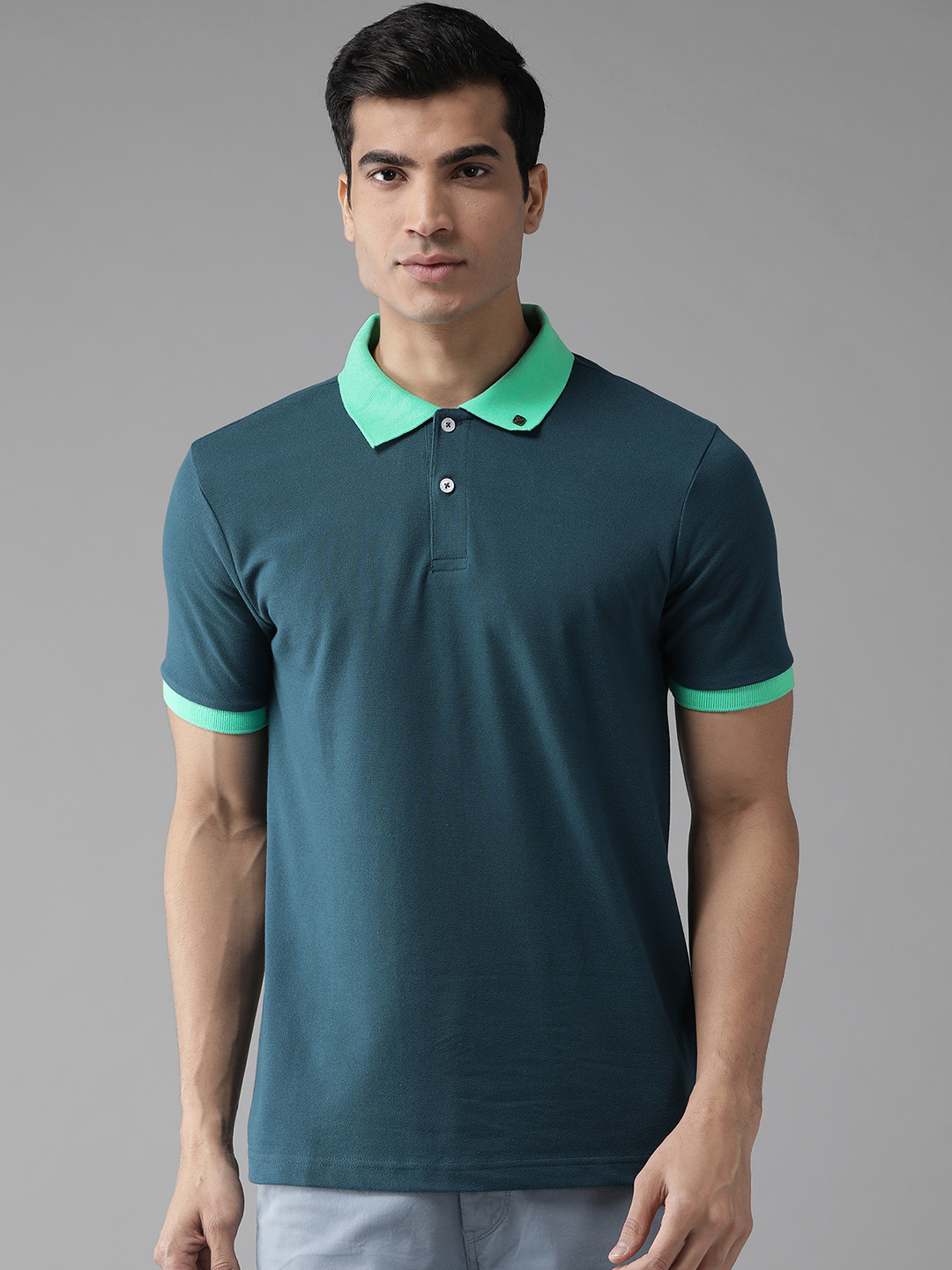 

Hubberholme Men Teal Blue Solid Polo Collar T-shirt