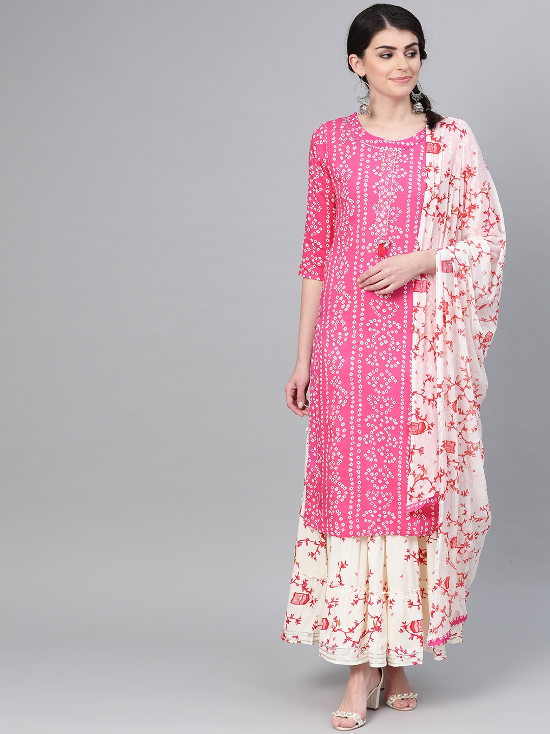 

Ishin Women Pink & Off-White Bandhani Print Kurta with Skirt & Dupatta