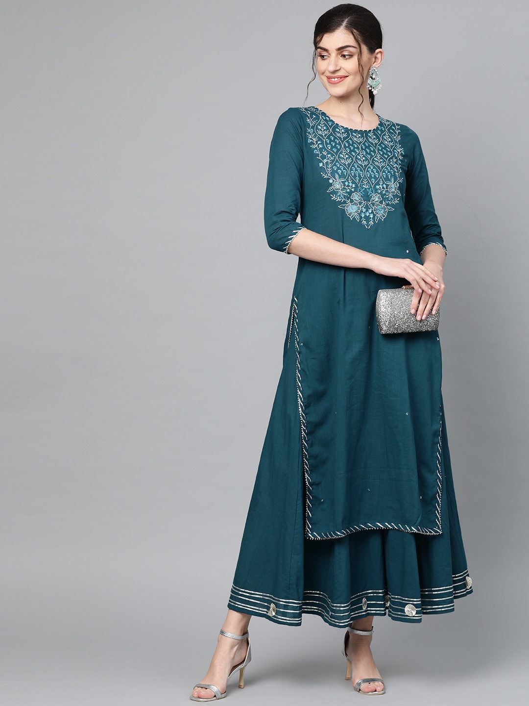 

Ishin Women Teal Blue & Silver Yoke Design Kurta with Palazzos