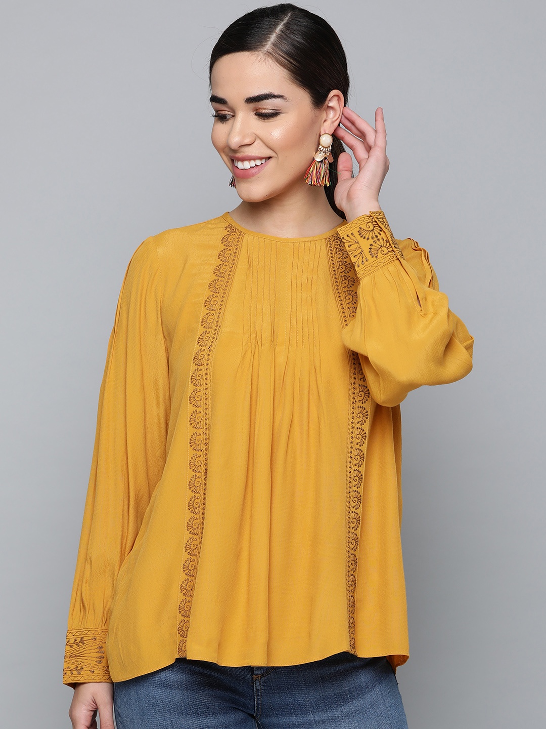 

Label Ritu Kumar Women Mustard Yellow Solid A-Line Top