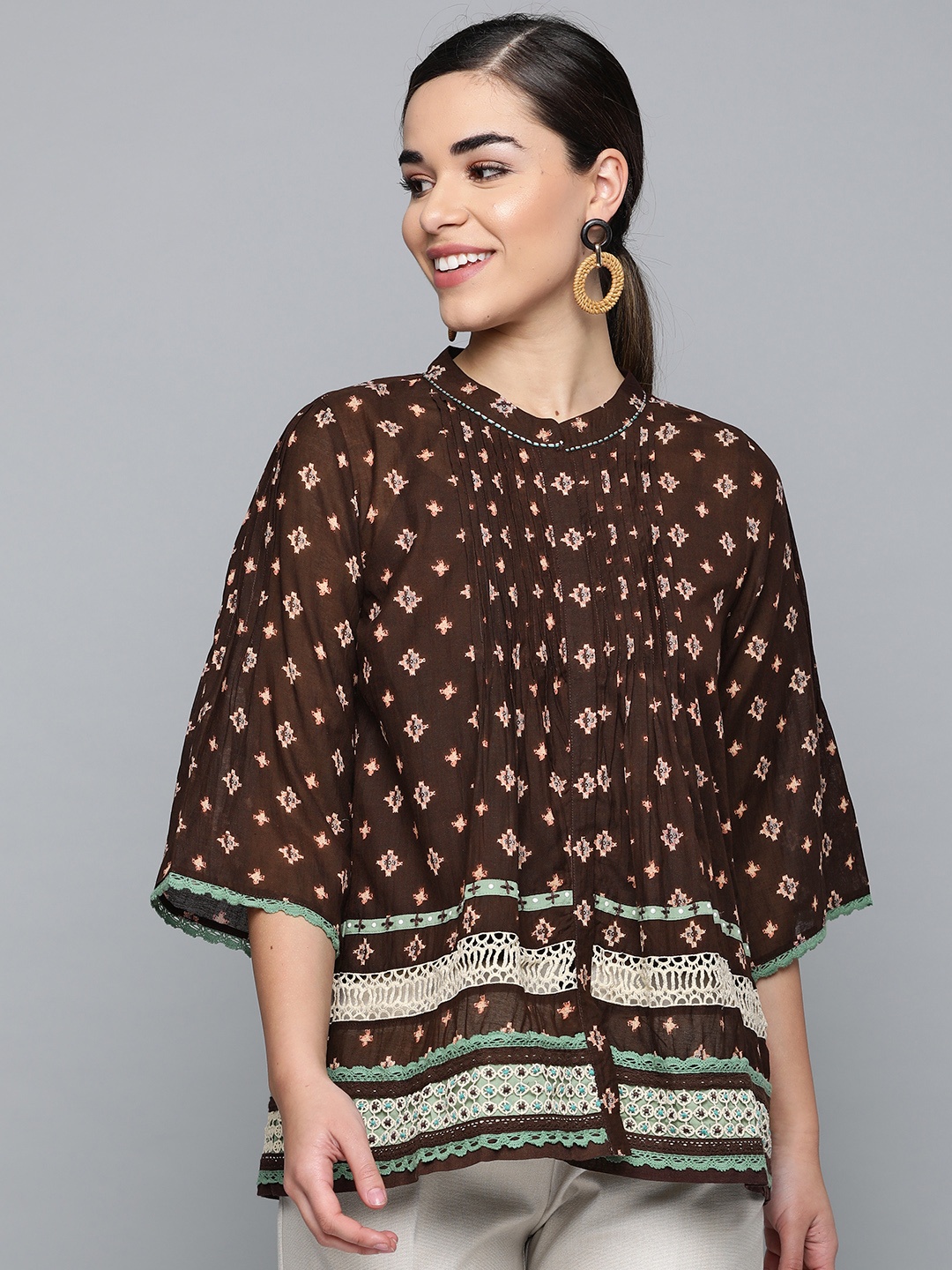 

Label Ritu Kumar Women Brown Printed A-Line Top