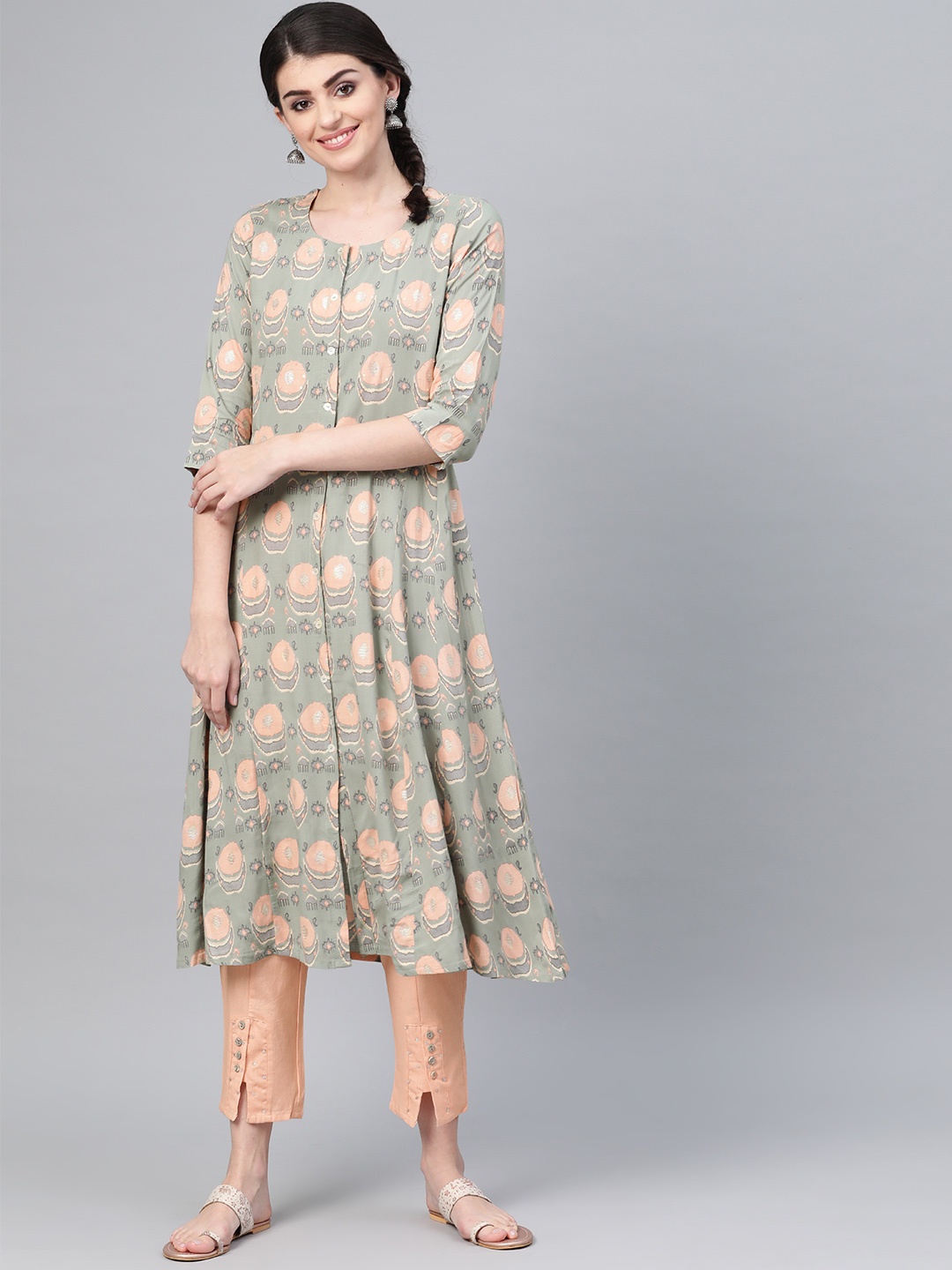 

Ishin Women Green & Peach-Coloured Printed Kurta with Trousers