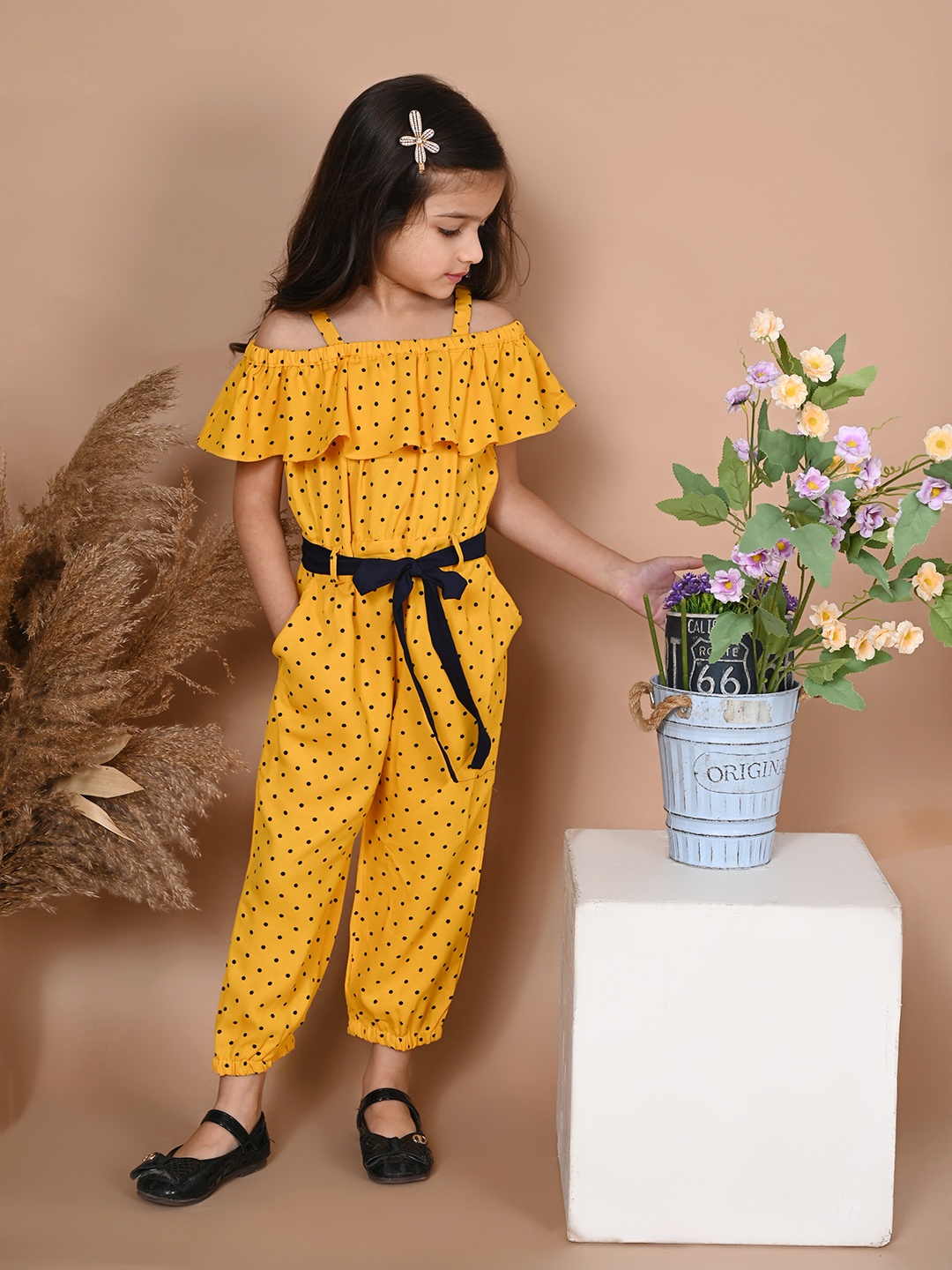 

LilPicks Girls Mustard Yellow & Black Printed Basic Jumpsuit