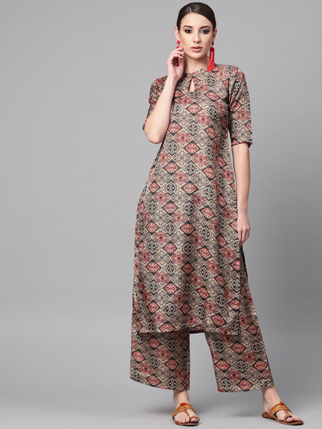 

Gerua By Libas Women Beige Red Printed Kurta with Palazzos