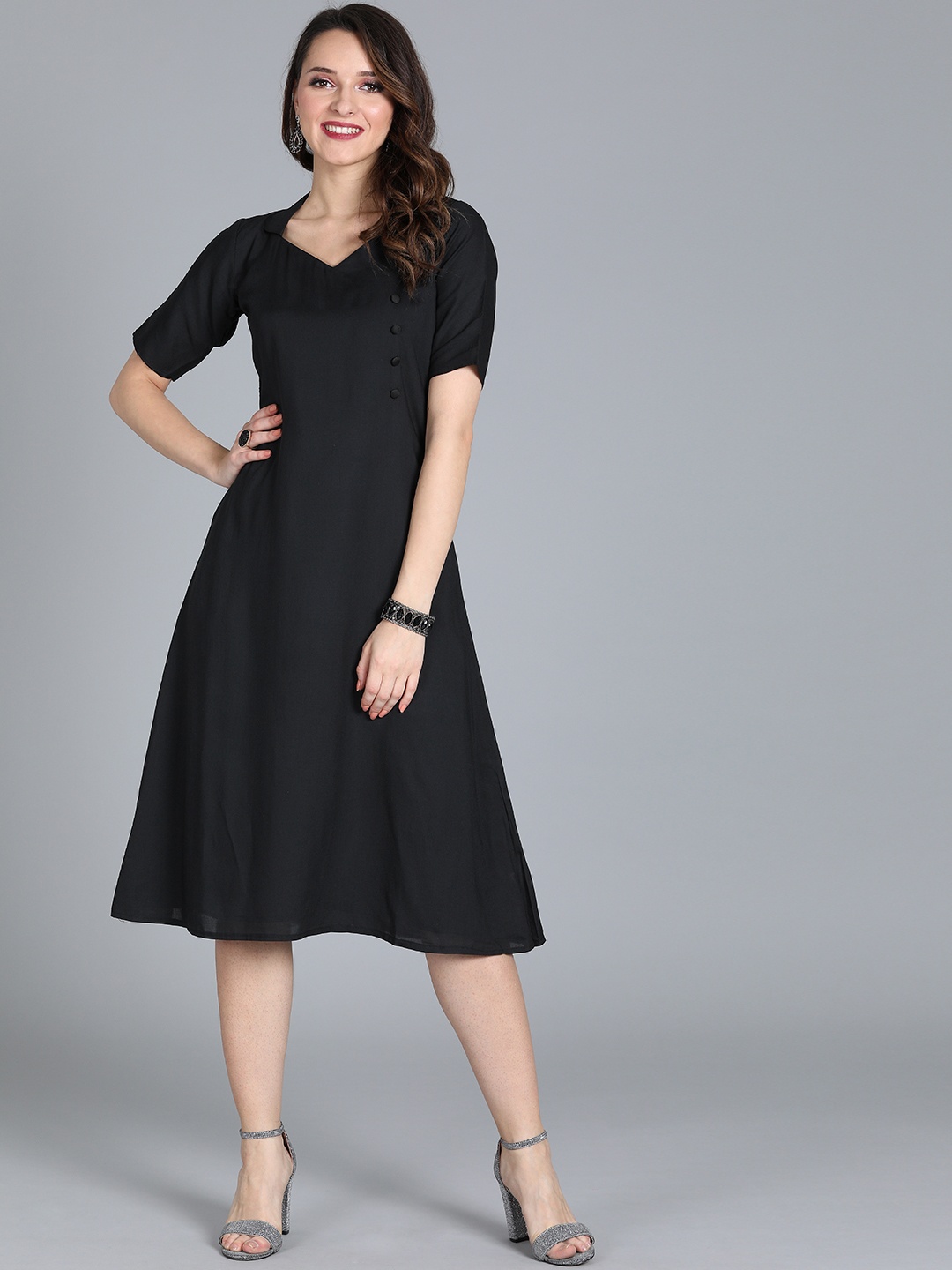 

Ethnovog Women Black Solid Made To Measure Tencel Knee Length Gown