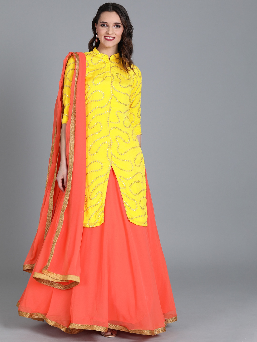 

Ethnovog Yellow Orange Embellished Made to Measure Lehenga Blouse with Dupatta