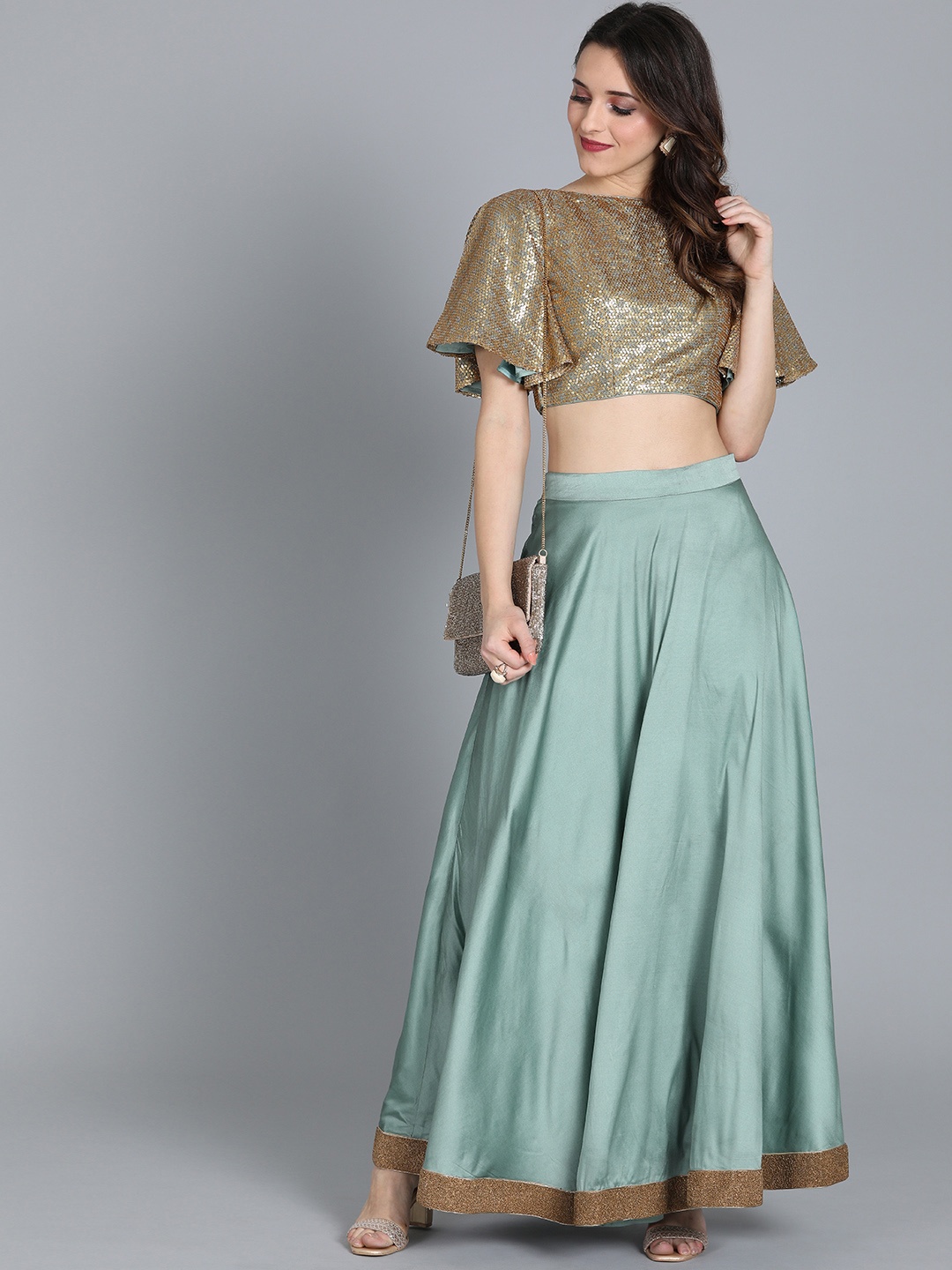 

Ethnovog Teal Green Gold-Toned Made to Measure Embellished Lehenga with Blouse