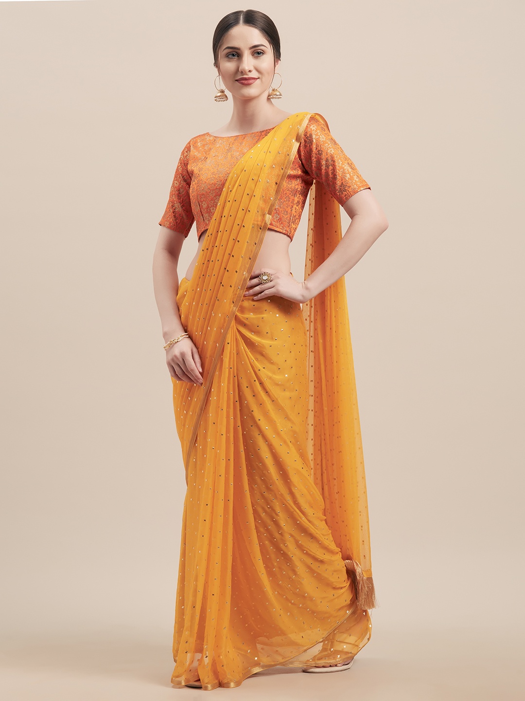 

Tikhi Imli Yellow Embellished Poly Georgette Saree