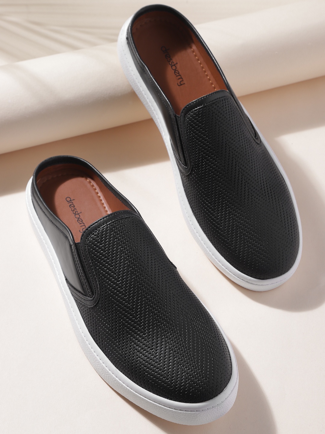 

DressBerry Women Black Textured Slip-On Sneakers