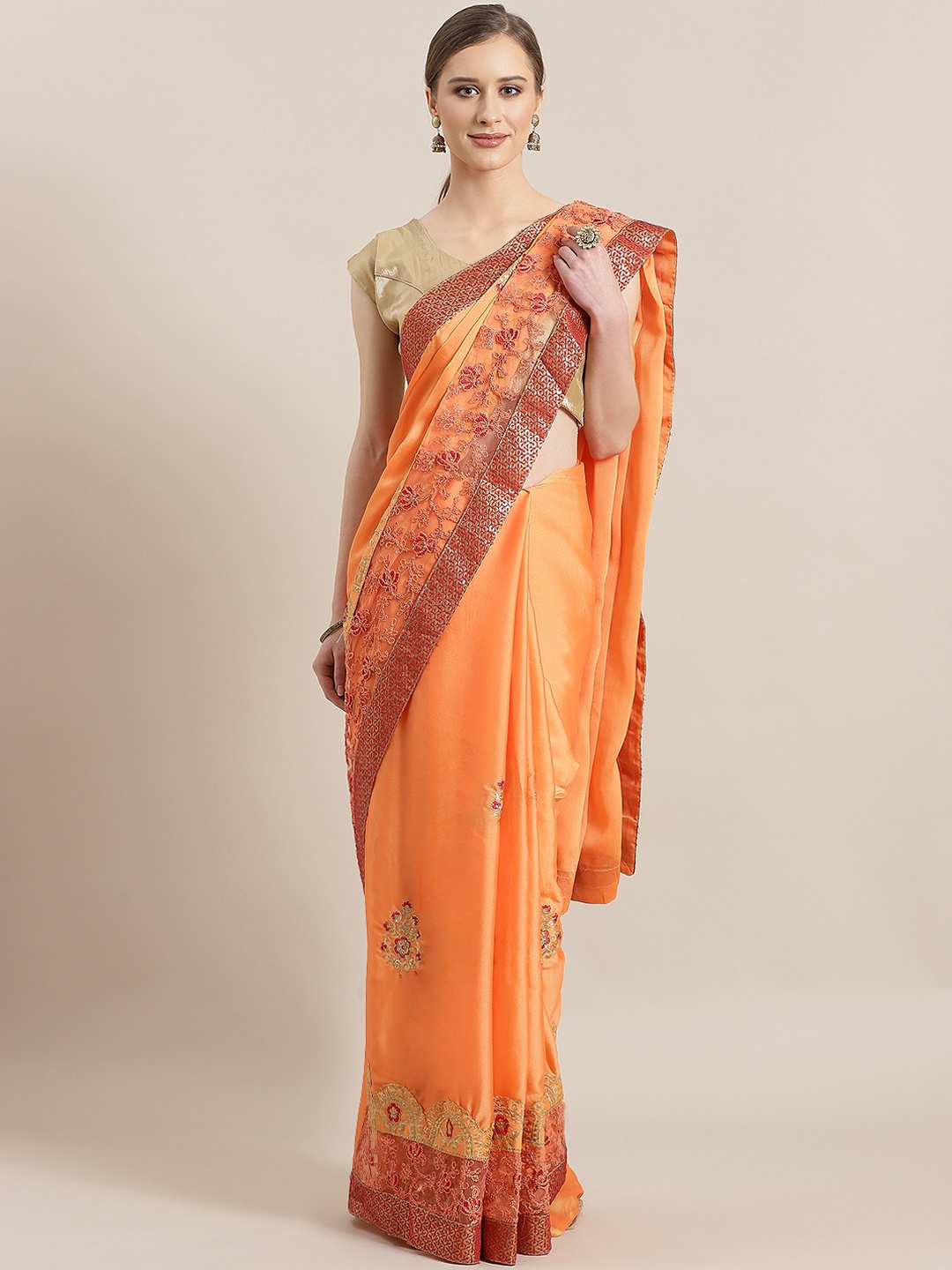 

Kalista Orange & Golden Embroidered Saree