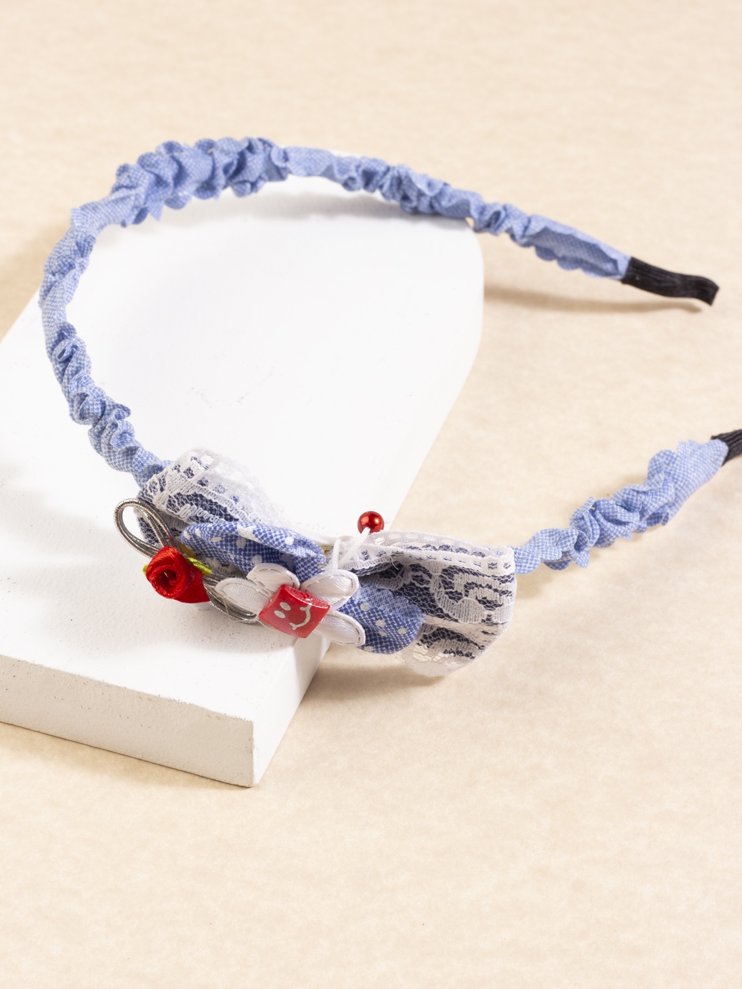 

AccessHer Blue Embellished Hairband