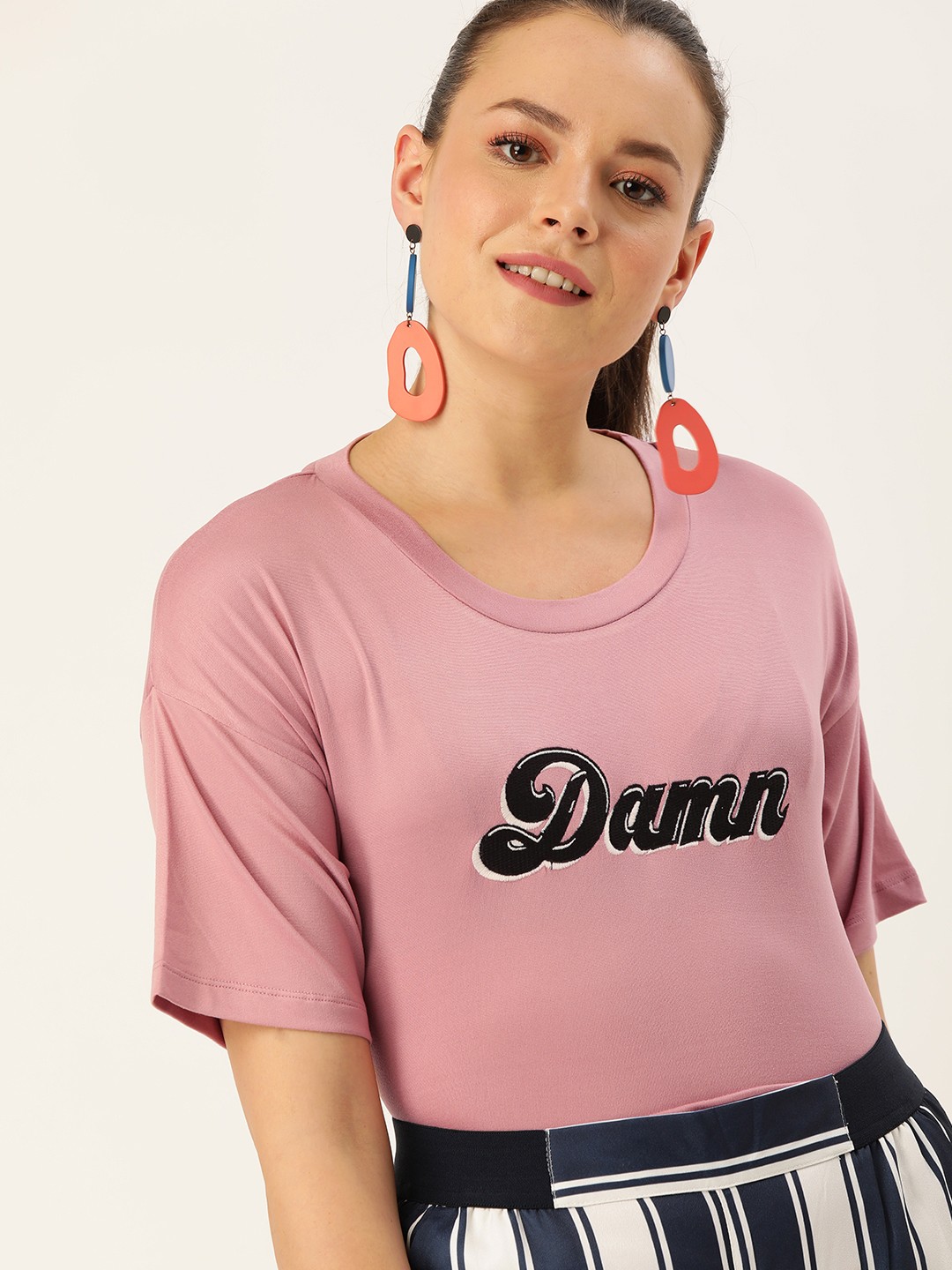 

DressBerry Women Mauve Solid Round Neck T-shirt With Printed Detailing