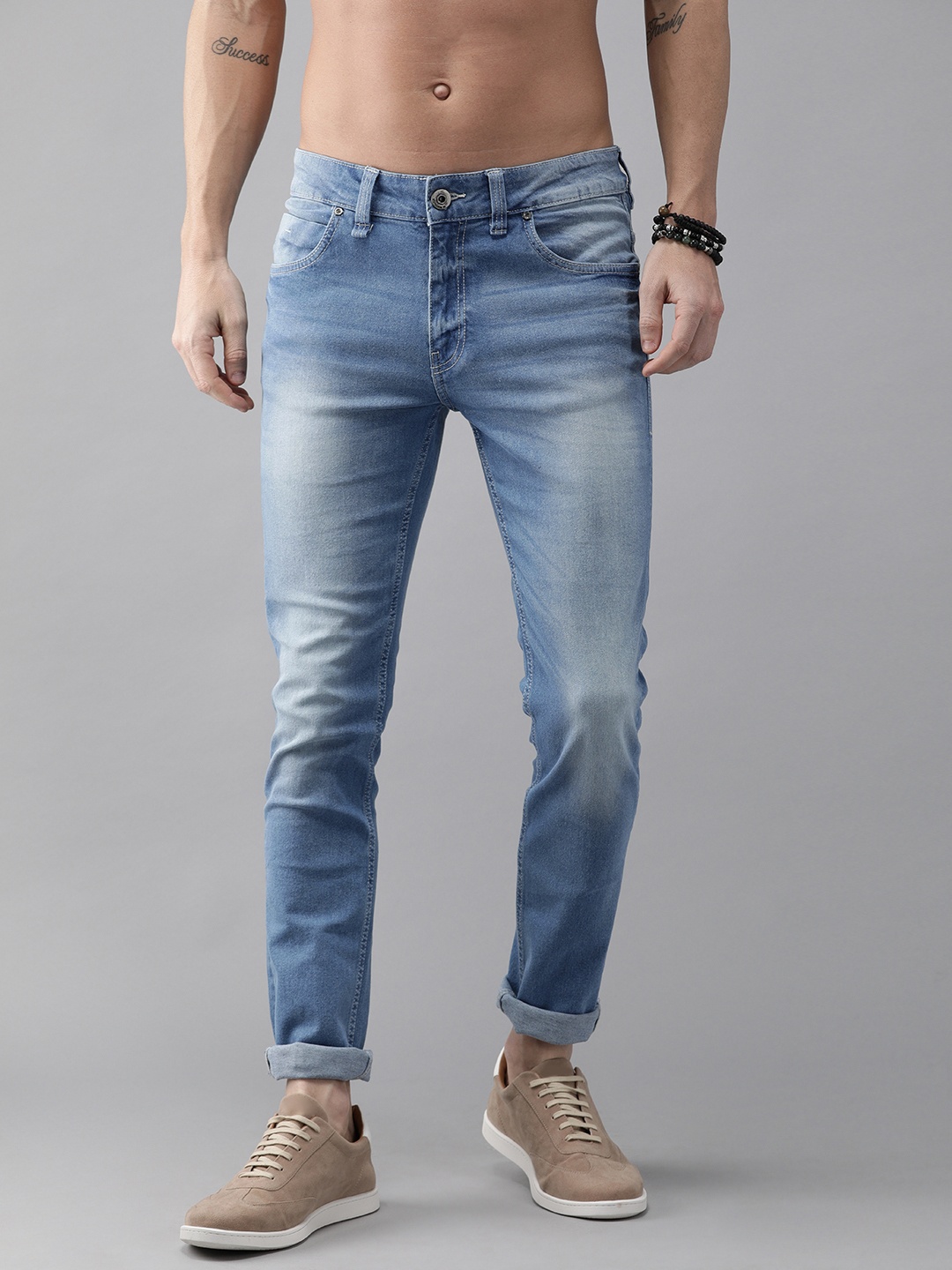 

Roadster Men Blue Skinny Fit Mid-Rise Clean Look Stretchable Reduced Water Jeans