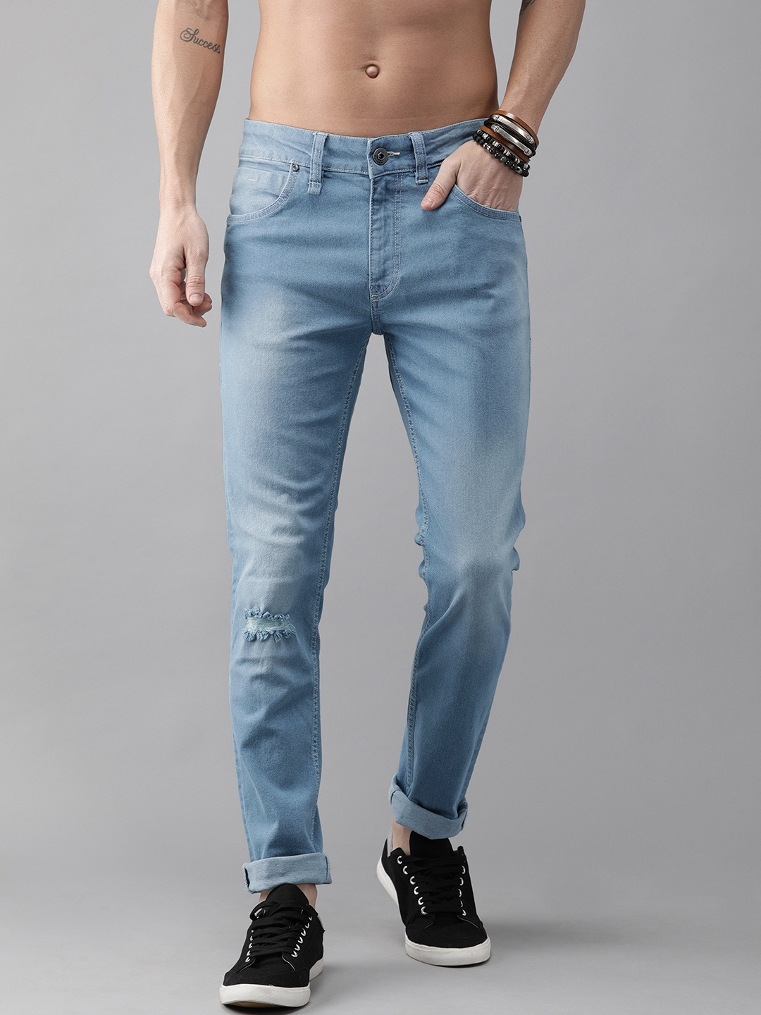 

Roadster Green Turn Men Blue Skinny Mid-Rise Mildly Distressed SaveWater Stretchable Jeans