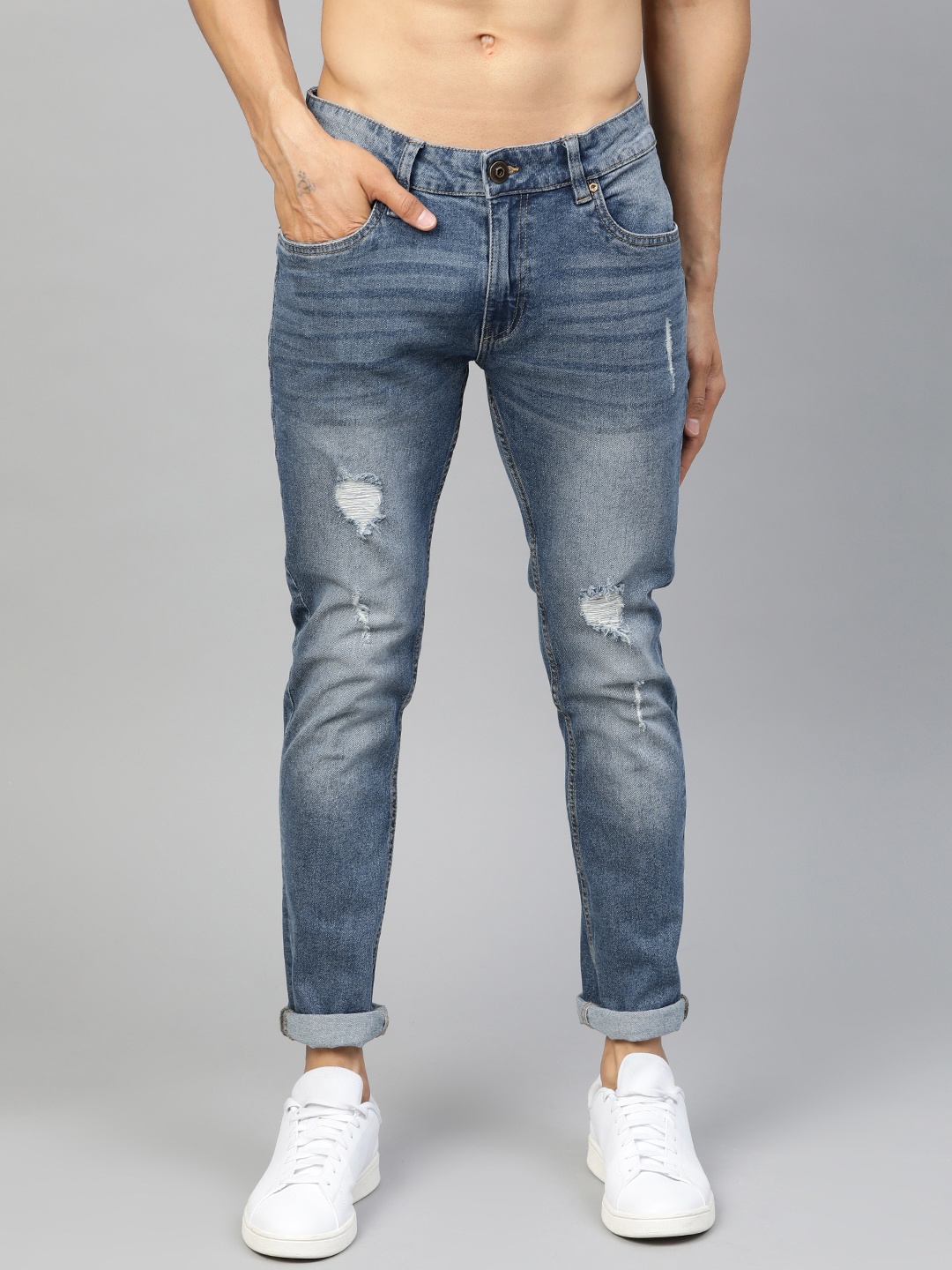 

Roadster Men Blue Tapered Fit Mid-Rise Mildly Distressed Stretchable Jeans