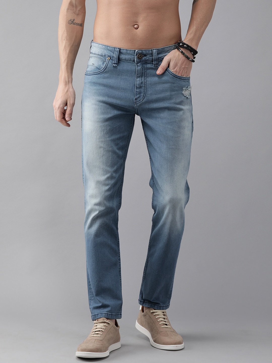 

Roadster Men Blue Slim Fit Mid-Rise Mildly Distressed Stretchable Reduced Water Jeans