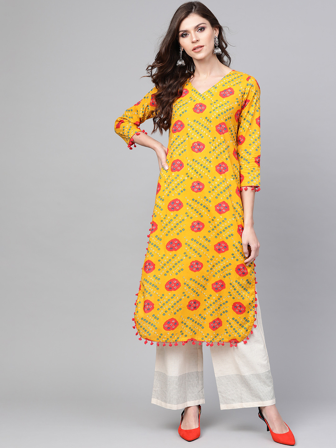 

AHIKA Women Mustard Yellow & Blue Printed Straight Kurta