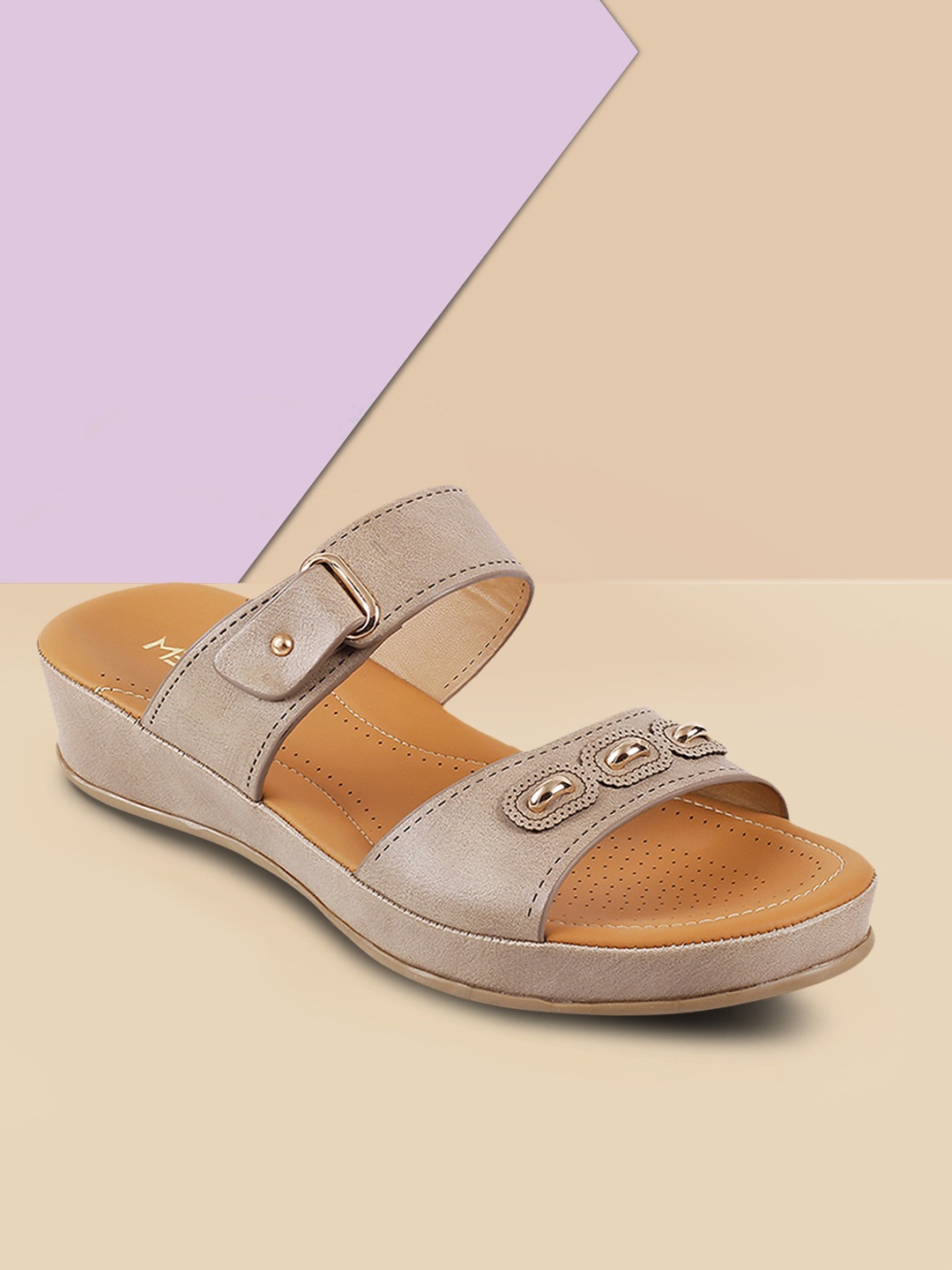 

Metro Women Beige Solid Mules